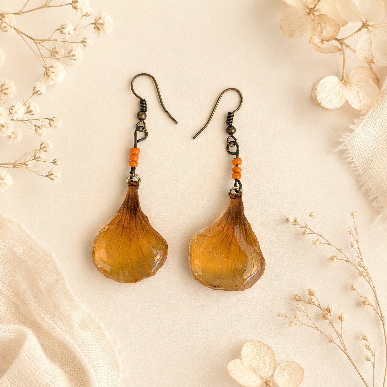 Boucles d'oreilles capucine orange ambré et joli décor